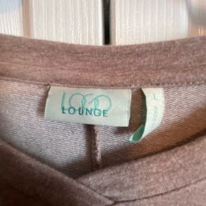 Logo Lounge.  - light cozy soft -not quite sweatshirt thickness.